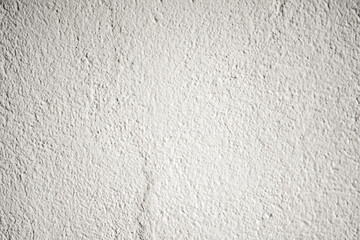 Old rustic white colored grunge wall. Concrete wall surface.