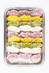 Chinese New Year food: a box of colorful dumplings