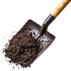 Garden Shovel with Soil Ready for Planting in Outdoor Garden Space Amidst Natural Setting
