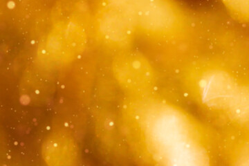 Abstract light blur, gold bokeh effect background. Defocused sun shine, sparkling lights, glittering glow for festival.