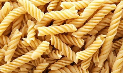 Uncooked spiral pasta background, ideal for Italian food recipe or culinary blog