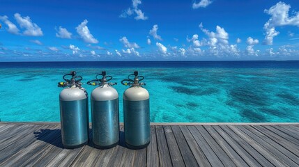 Obraz premium Oxygen tanks lined up on a boat deck, ready for a diving adventure, with clear skies and turquoise waters beyond