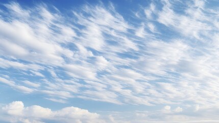 Fototapeta premium Dramatic cirrus clouds majestically soaring and stretching across the vast expansive celestial sky at high altitudes creating a serene and atmospheric landscape