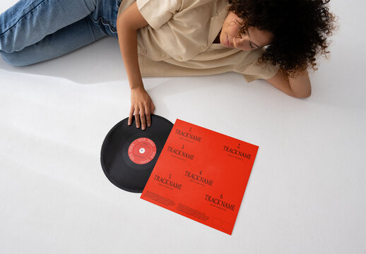 Mockup Of Woman Lying With Customized Album