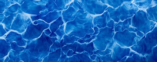 Obraz premium Deep Blue Ocean Waves Texture with Swirling Patterns and Reflection