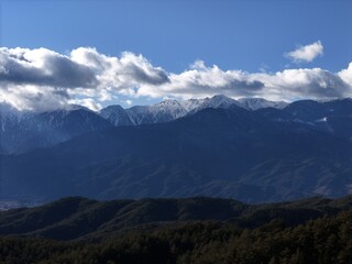 Naklejka premium A drone aerial photo of the landscape of the city of Komagane City, Nagano Prefecture.
