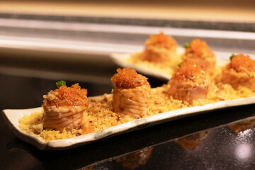 Delicious sushi on a stylish plate.
