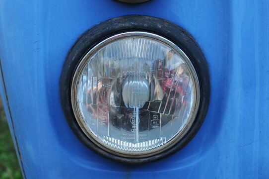 headlight of an car - Powered by Adobe