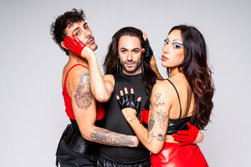 Non-binary Person Poses With Two Friends Celebrating Queer Identity and Self-Expression