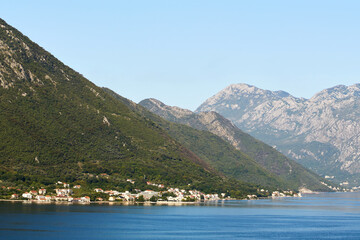 Quiet mountain valley lake with greenery