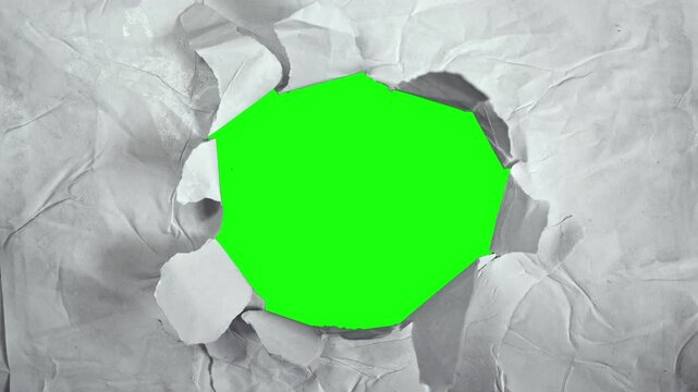 White crumpled paper with hole on chroma key green