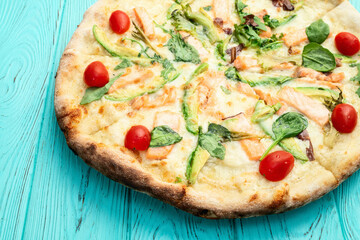 Italian pizza with avocado salmon  tomatoes and mozzarella photography. top view