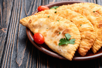 Snack chebureks. Pasties with meat photography . Top view