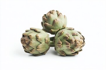 Obraz premium Pile of three artichokes isolated on a white background