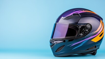 Fototapeta premium Stylish Colorful Motorcycle Racing Helmet with Glossy Finish Against a Blue Background