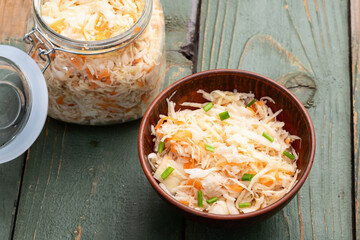 Tasty marinated cabbage with carrot, healthy food  Sauerkraut photography . Top view