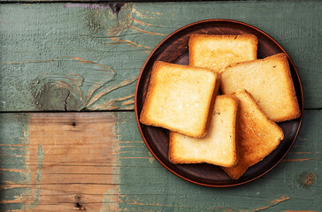 Toast bread in a plate photography . Top view