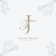 JT TJ initial letter handwriting monogram logo.
