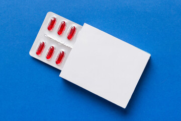 Blank White Product Package Box Mock-up. Open blank medicine drug box with Vatamin a blister top view