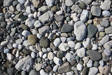 river bed pebbles at river side