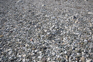 river bed pebbles at river side
