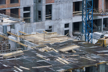Construction workers fabricating steel reinforcement bar at the construction site