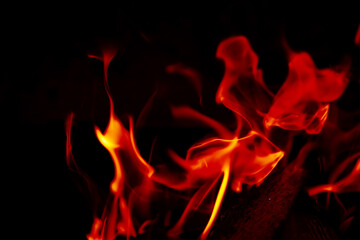 Fototapeta premium Background of the flame in the oven. Overlay layer. Tongues of fire in a fireplace.