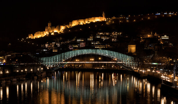 Georgia, Tbilisi, Bridge of Peace and Narikala fortress at night