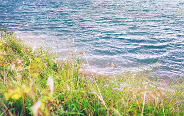 Water surface. The texture of the water. Waves on the lake in windy weather.