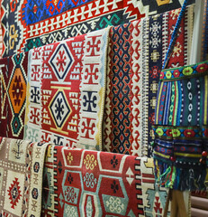 Beautiful handcrafted Albanian carpets showcasing traditional designs and vibrant colors in a local...