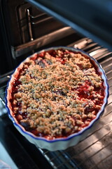 close up view of fruit crumble, top view taken out of the oven