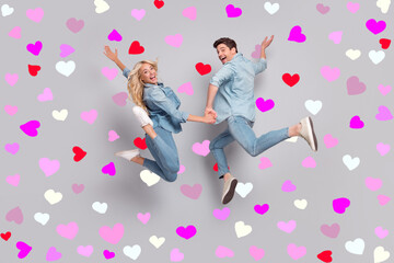 Back full size photo of cool couple jump wear jeans shirt shoes isolated on grey color background