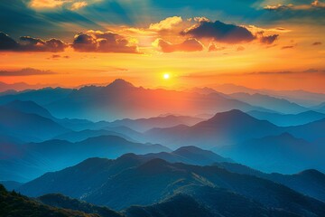 Obraz premium The sun is setting over a mountain range