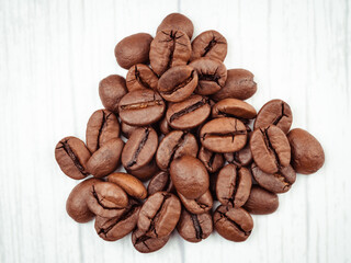 roasted coffee beans isolated in white background