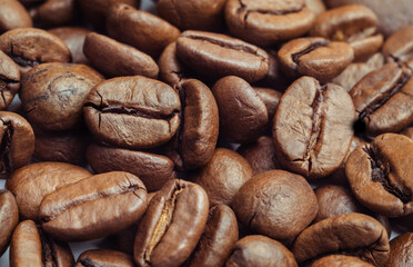 roasted coffee beans isolated in white background