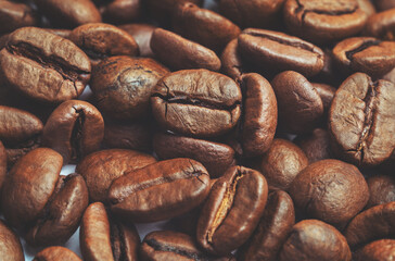 roasted coffee beans isolated in white background