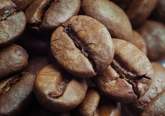 roasted coffee beans isolated in white background