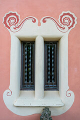 Old windows of a historical building in Barcelona