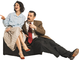 Elegant young woman and man in classical retro clothes sitting, looking away, pointing and taking isolated on transparent background. Discussing, rumors, gossips. Concept of retro and vintage, fashion