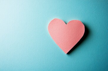 Fototapeta premium Valentine's Day background with pink paper hearts on a pastel-colored surface
