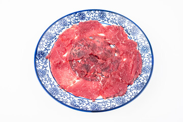 A plate of sliced ​​beef for hot pot