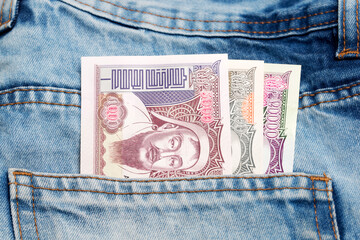 Mongolian tugrik in the pocket of blue jeans
