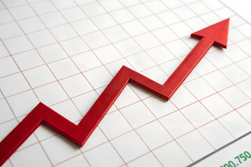 Obraz premium Red Upward Arrow Graph Showing Rising Trend | Business Stock Image