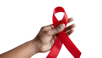 Hand gripping a red ribbon to mark December's World AIDS Day, the month for multiple myeloma cancer awareness, and National Red Ribbon Week. It's all about healthcare and raising awareness for cancer