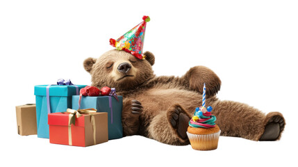 Teddy bear wearing a birthday hat with a colorful cupcake on a table.