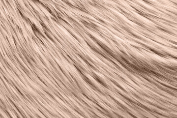 Faux fur in mocha mousse shade, closeup. Trendy color of 2025 year