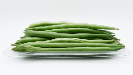  Green raw asparagus beans isolated on white background