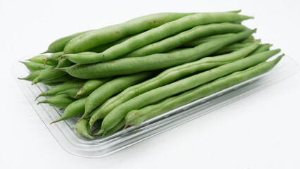  Green raw asparagus beans isolated on white background
