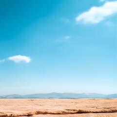 Fototapeta premium Vibrant Blue Sky over Golden Brown Landscape with Cloud Puffs