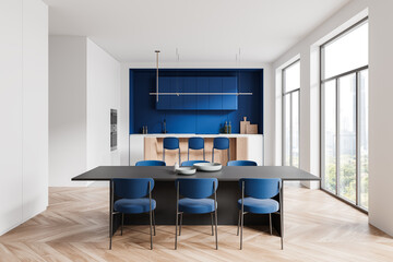 Modern kitchen and dining area with blue accents and sleek design. 3D Rendering